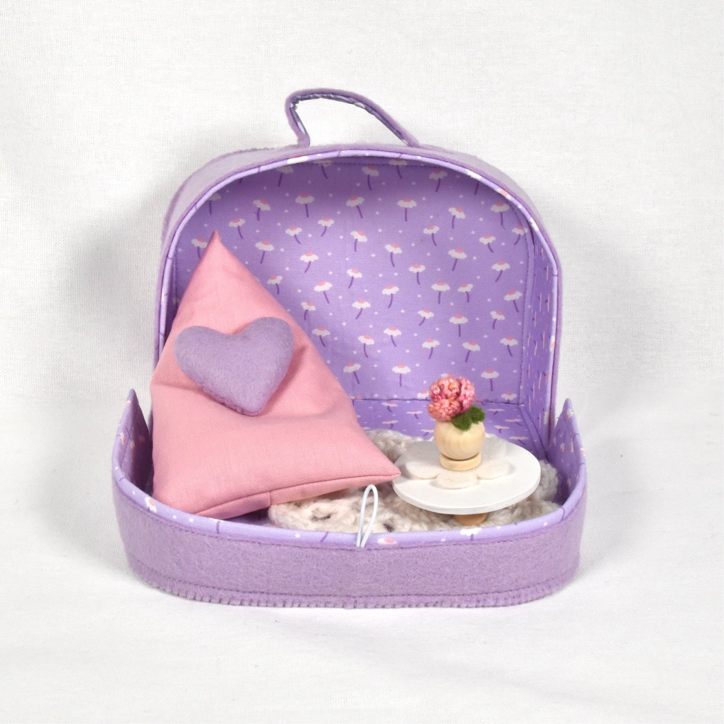 Suitcase with living room furniture