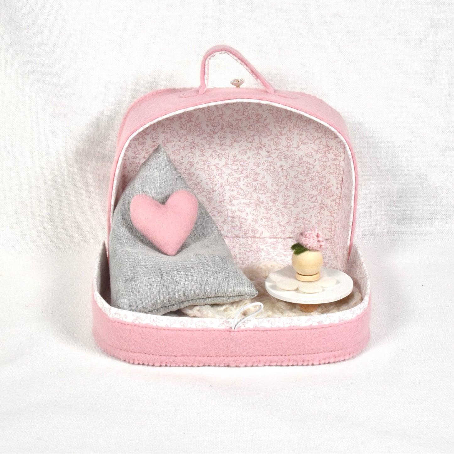 Suitcase with living room furniture